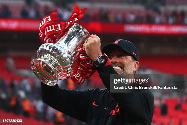 Liverpool manager Jurgen Klopp celebrates with the trophy following The FA Cup Final match between Chelsea and Liverpool at Wembley Stadium on May...