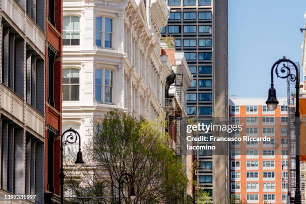 soho, new york city. residential and shopping district, buildings and cityscape - the soho house stock pictures, royalty-free photos & images