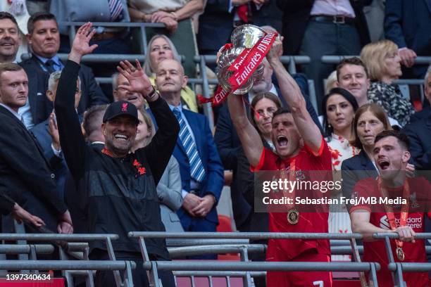 Jurgen Klopp and James Milner of Liverpool lifts the FA Cup after his sides 6-5 penalty shoot-out win after a 0-0 draw during The FA Cup Final match...