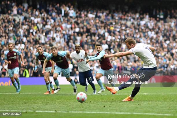 Harry Kane of Tottenham Hotspur scores their team's first goal from the penalty spot during the Premier League match between Tottenham Hotspur and...