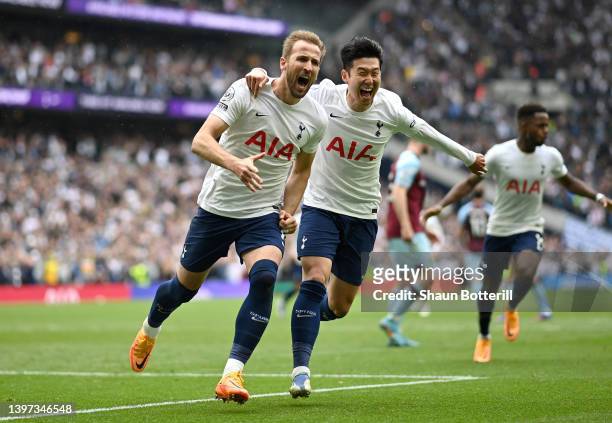 Harry Kane celebrates with Heung-Min Son of Tottenham Hotspur after scoring their team's first goal during the Premier League match between Tottenham...