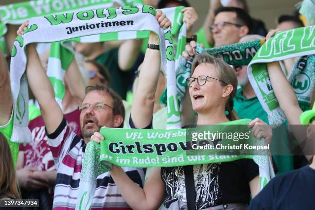 Fans of Wolfsburg react during the FLYERALARM Frauen-Bundesliga match between VfL Wolfsburg women and Bayer 04 Leverkusen women at AOK-Stadion on May...