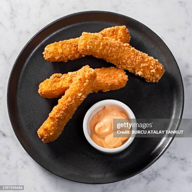 fried mozzarella cheese sticks - breaded stock pictures, royalty-free photos & images