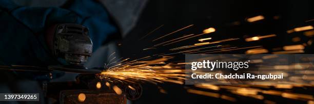 worker grinding metal close up. banner concept. - sharpening stock pictures, royalty-free photos & images
