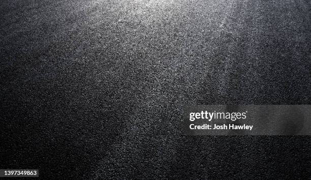 asphalt road backgrounds - coloured tarmac stock pictures, royalty-free photos & images