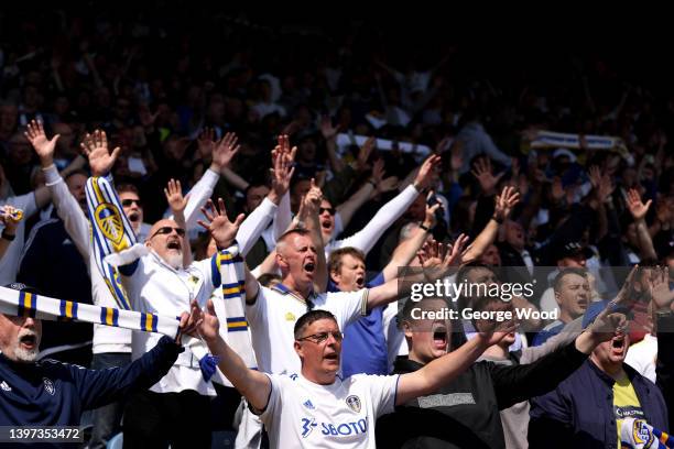 Fans of Leeds United react in the crowd during the Premier League match between Leeds United and Brighton & Hove Albion at Elland Road on May 15,...