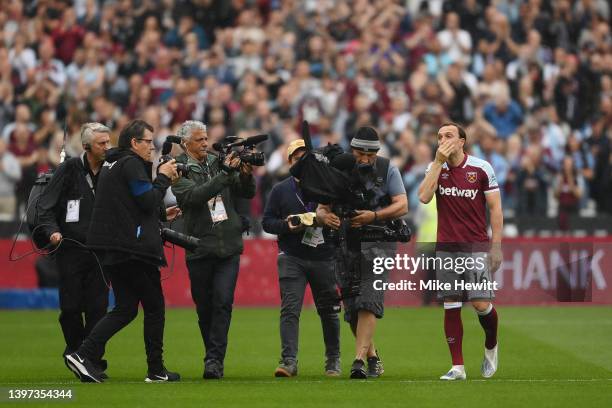 Mark Noble of West Ham United reacts ahead of playing their final Home Game for West Ham United during the Premier League match between West Ham...