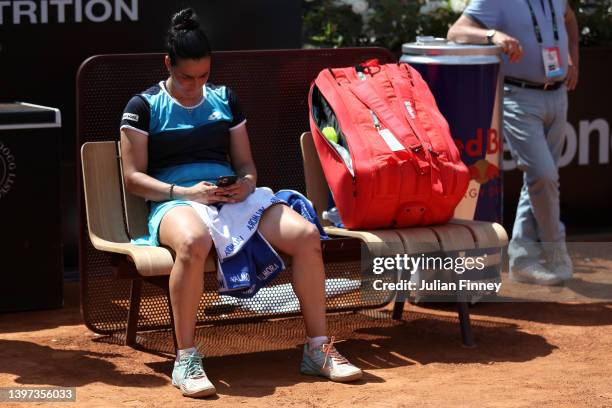 Ons Jabeur of Tunisia looks dejected following their defeat against Iga Swiatek of Poland during the Women's Single's Final on Day 8 of the...