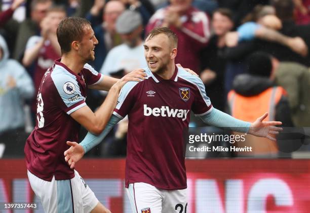 Jarrod Bowen of West Ham United celebrates their sides first goal with team mate Tomas Soucek during the Premier League match between West Ham United...