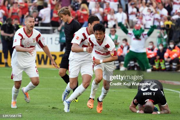 Wataru Endo of VfB Stuttgart celebrates after scoring their team's second goal during the Bundesliga match between VfB Stuttgart and 1. FC Köln at...