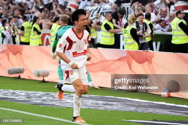 Wataru Endo of VfB Stuttgart celebrates after scoring their team's second goal during the Bundesliga match between VfB Stuttgart and 1. FC Köln at...