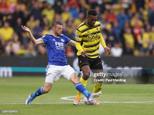 Jamie Vardy of Leicester City battles for possession with Christian Kabasele of Watford FC during the Premier League match between Watford and...