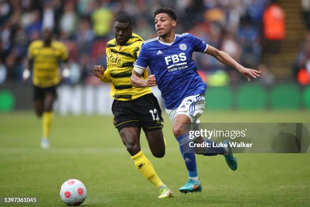 James Justin of Leicester City battles for possession with Ken Sema of Watford FC during the Premier League match between Watford and Leicester City...