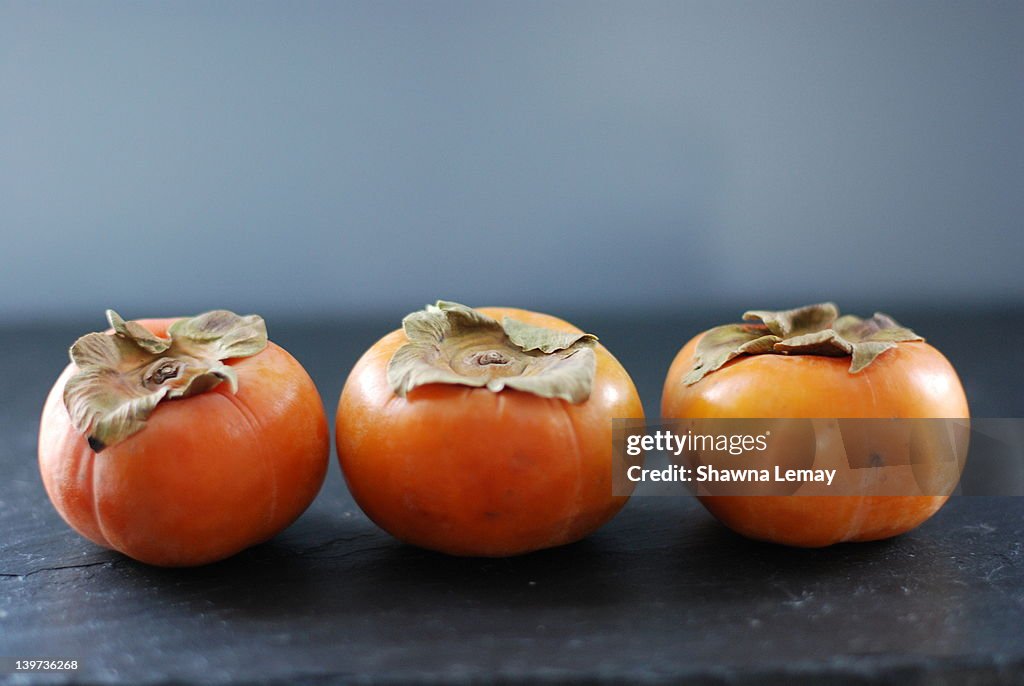 Three persimmons