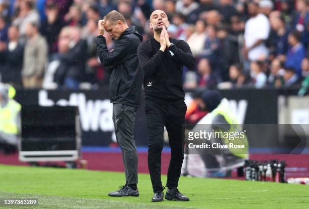 Pep Guardiola, Manager of Manchester City reacts during the Premier League match between West Ham United and Manchester City at London Stadium on May...