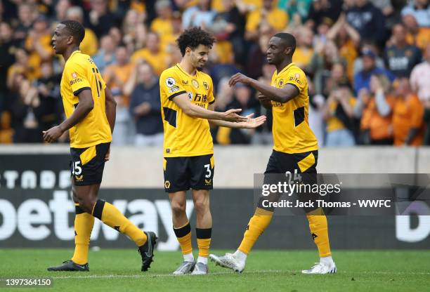 Rayan Ait-Nouri celebrates with Toti Gomes of Wolverhampton Wanderers after scoring their team's first goal during the Premier League match between...