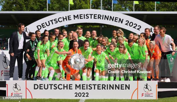 The team of Wolfsburg celebrates winning the German Champion ships after the FLYERALARM Frauen-Bundesliga match between VfL Wolfsburg women and Bayer...