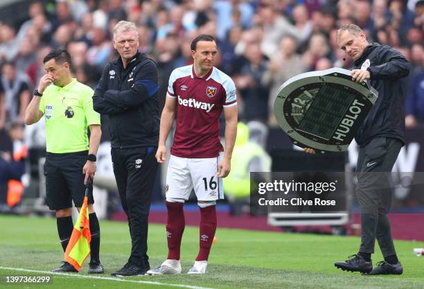 Mark Noble of West Ham United is substituted on for their final home appearance for West Ham United during the Premier League match between West Ham...