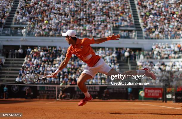 Novak Djokovic of Serbia plays a backhand against Stefanos Tsitsipas of Greece during the Men's Single's Final on Day 8 of the Internazionali BNL...