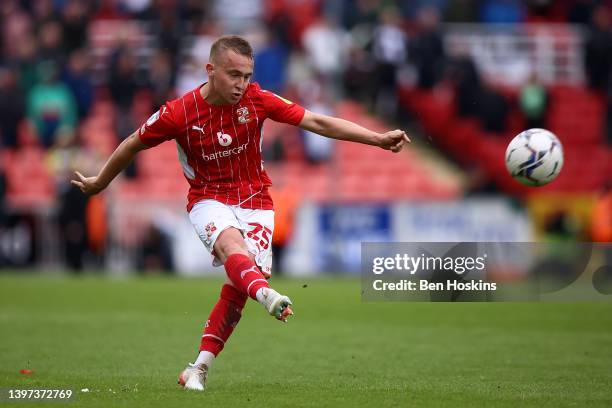 Louis Reed of Swindon in action during the Sky Bet League Two Play-off Semi Final 1st Leg match between Swindon Town and Port Vale at County Ground...
