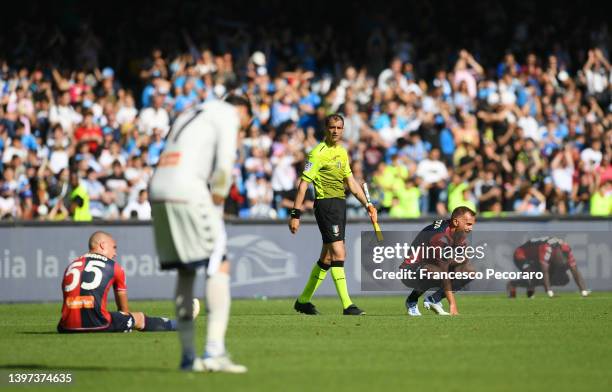 Players of Genoa CFC react following defeat against SSC Napoli, confirming their relegation after the final whistle of the Serie A match between SSC...