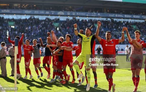 Players of Hamburger SV celebrate after securing a Play-Off position after victory in the Second Bundesliga match between FC Hansa Rostock and...