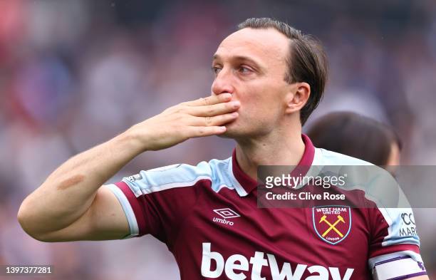 Mark Noble of West Ham United reacts after playing their last home game for West Ham United following the Premier League match between West Ham...