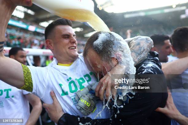 Ole Werner, Manager of SV Werder Bremen, celebrates after securing promotion to the Budesliga after victory in the Second Bundesliga match between SV...