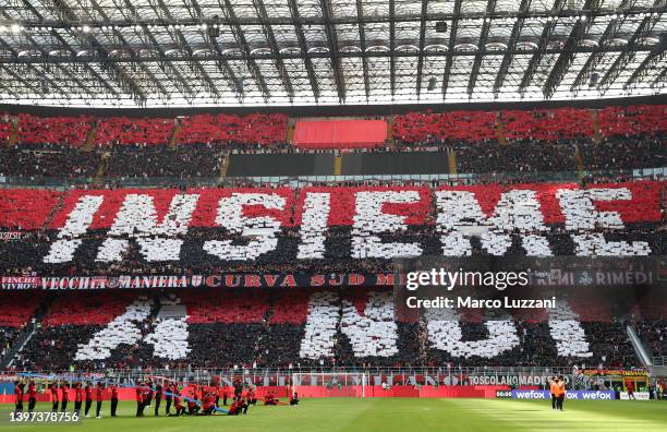 Fans of AC Milan display a message inside of the stadium ahead of the Serie A match between AC Milan and Atalanta BC at Stadio Giuseppe Meazza on May...