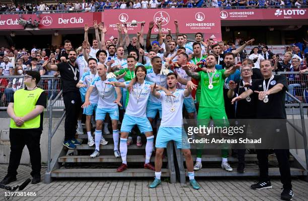 Players of FC Schalke 04 celebrate after winning the 2. Bundesliga after their sides victory in the Second Bundesliga match between 1. FC Nürnberg...