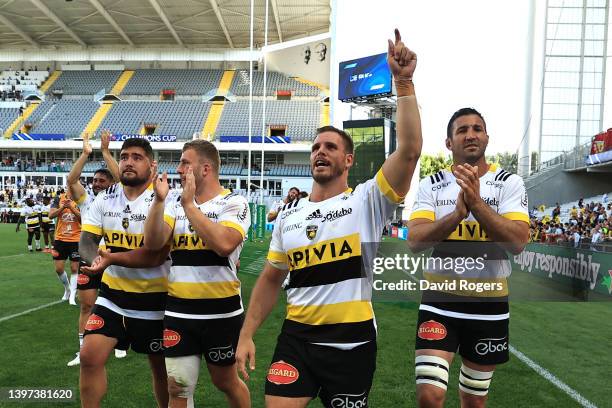 Facundo Bosch of La Rochelle leads the celebrations with team mates after their victory during the Heineken Champions Cup Semi Final match between...