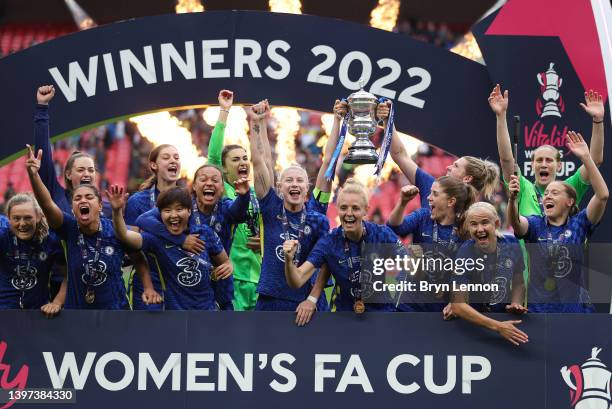 Magdalena Eriksson and Millie Bright of Chelsea lift the Vitality Women's FA Cup trophy after their sides victory during the Vitality Women's FA Cup...