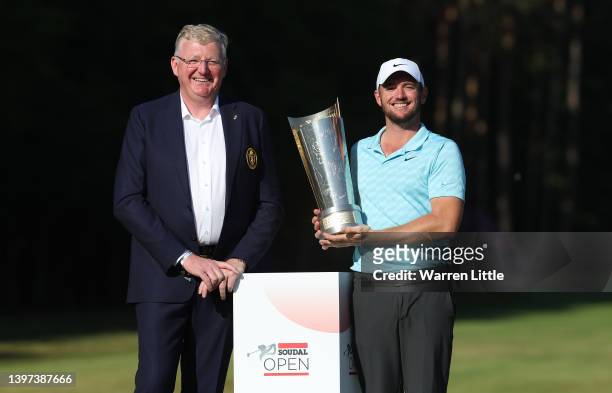Sam Horsfield of England with the trophy after winning the Soudal Open with Phillippe Delhaye, President of Royal Belgium Golf Federation during Day...