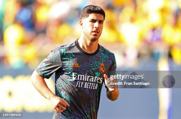 Marco Asensio of Real Madrid warms up prior to kick off of the LaLiga Santander match between Cadiz CF and Real Madrid CF at Estadio Nuevo Mirandilla...