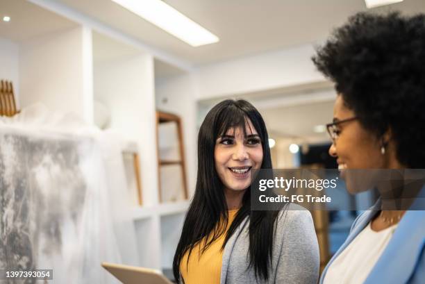 coworkers talking at architects' studios - storefront-for-art-and-architecture stock pictures, royalty-free photos & images