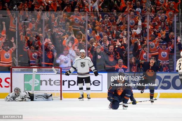 Connor McDavid and Kailer Yamamoto of the Edmonton Oilers celebrate a goal against the Los Angeles Kings during the third period in Game Seven of the...