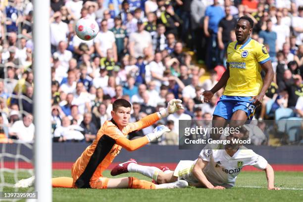 Danny Welbeck of Brighton & Hove Albion scores their side's first goal past Illan Meslier and Diego Llorente of Leeds United during the Premier...