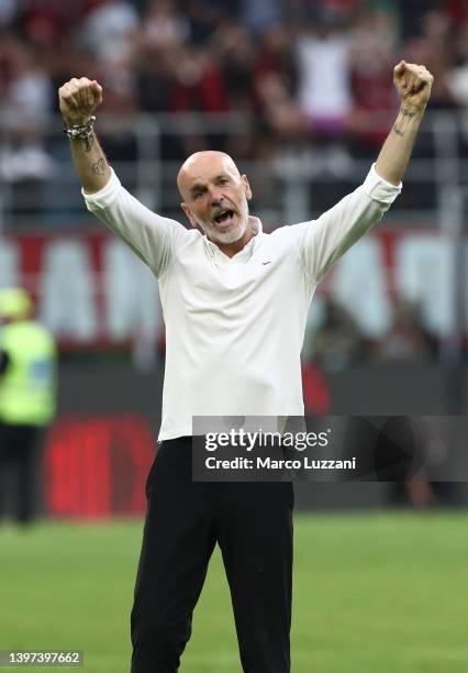 Stefano Pioli, Head Coach of AC Milan interacts with the crowd following the Serie A match between AC Milan and Atalanta BC at Stadio Giuseppe Meazza...