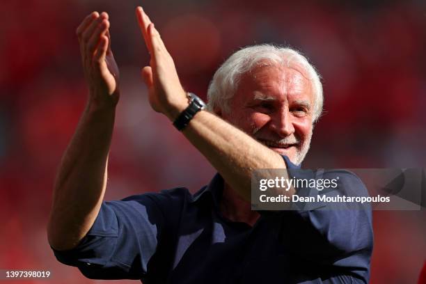 Rudi Voeller, Sporting Director of Bayer 04 Leverkusen acknowledges the fans following the Bundesliga match between Bayer 04 Leverkusen and...