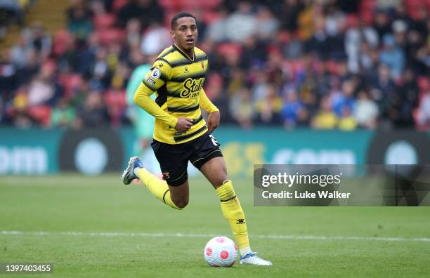 Joao Pedro of Watford FC runs with the ball during the Premier League match between Watford and Leicester City at Vicarage Road on May 15, 2022 in...