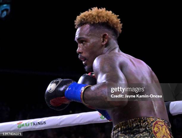 Jermell Charlo exchanges punches in the ring with Brian Castano during their super middleweight title fight at Dignity Health Sports Park on May 14,...