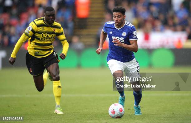 James Justin of Leicester City battles for possession with Ken Sema of Watford FC during the Premier League match between Watford and Leicester City...