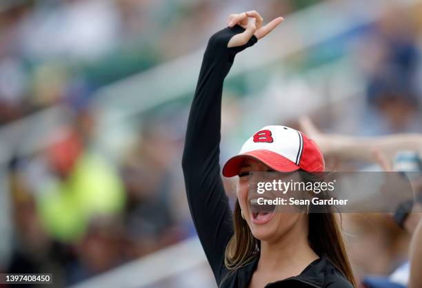 Fan cheers during the NASCAR Cup Series AdventHealth 400 at Kansas Speedway on May 15, 2022 in Kansas City, Kansas.