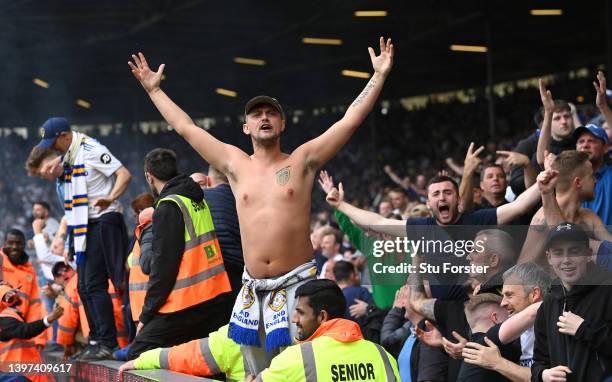 Leeds United fans support their team during the Premier League match between Leeds United and Brighton & Hove Albion at Elland Road on May 15, 2022...