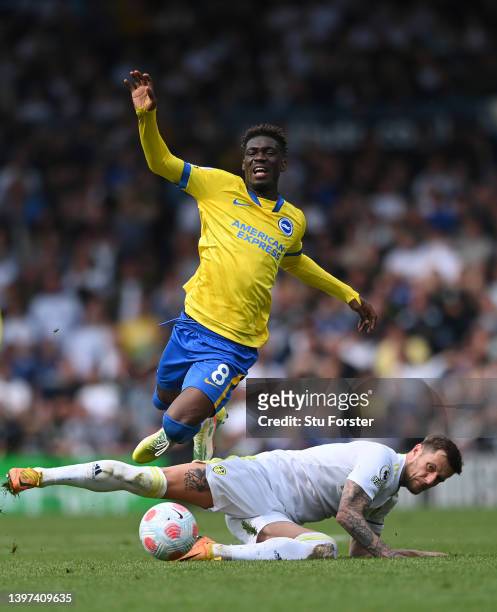 Leeds United captain Liam Cooper fouls Brighton player Yves Bissouma during the Premier League match between Leeds United and Brighton & Hove Albion...