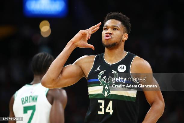 Giannis Antetokounmpo of the Milwaukee Bucks reacts after a three point basket during the first quarter against the Boston Celtics in Game Seven of...