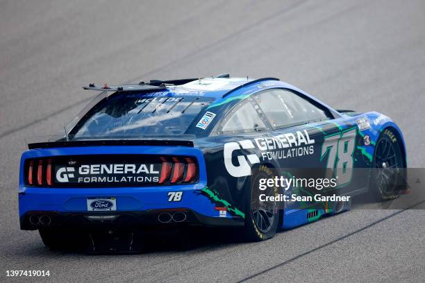 McLeod, driver of the General Formulations Ford, drives a damaged car during the NASCAR Cup Series AdventHealth 400 at Kansas Speedway on May 15,...