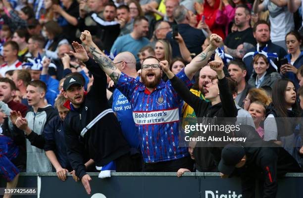 Fans of Stockport County show their support during the Vanarama National League match between Stockport County oand FC Halifax Town at Edgeley Park...