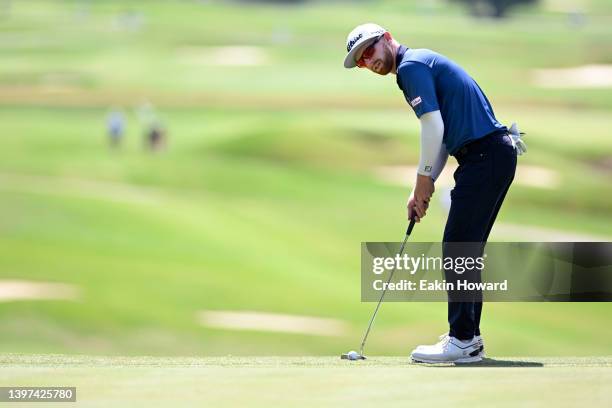 Anders Albertson prepares to putt on the 16th green during the final round of the Visit Knoxville Open at Holston Hills Country Club on May 15, 2022...