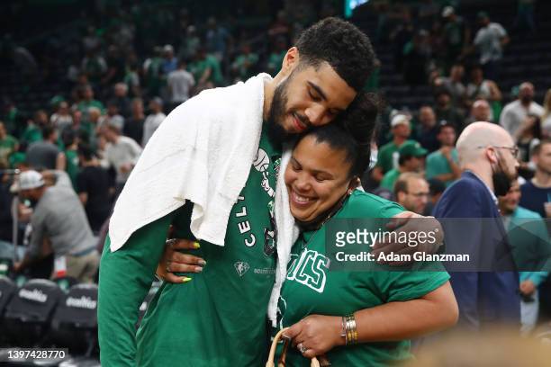 Jayson Tatum of the Boston Celtics celebrates with his mother, Brandy Cole, after defeating the Milwaukee Bucks 109-81 in Game Seven of the 2022 NBA...
